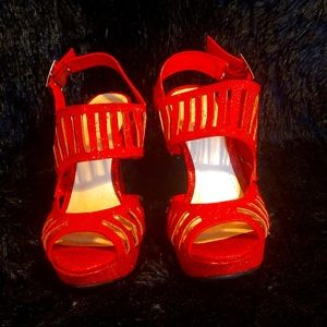 Woman's red glitter heel